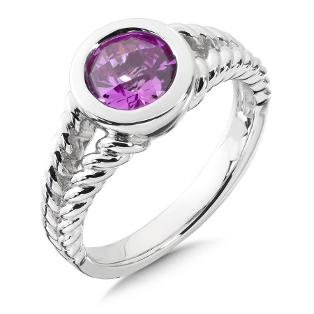 Sterling silver and round created pink sapphire ring.