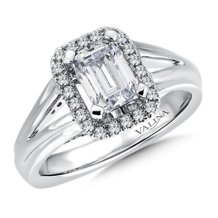 Stand out from the crowd with this special emerald cut halo engagement ring set in 14k white gold.