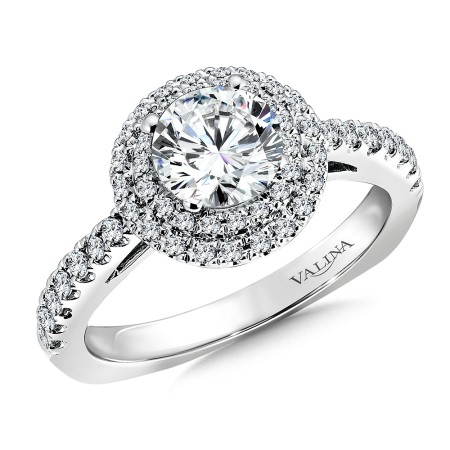 Round double halo diamond engagement ring set in 14k white gold.