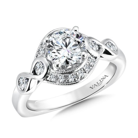 Oval shaped halo diamond engagement ring.
