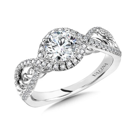 Two strands of diamonds weave over one another and around the center stone, representing your two lives, intertwining as one on your special day. R1058W